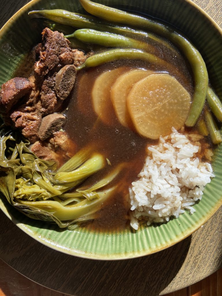 Filipino dish - pork sinigang, family recipe passed down. Fish and vegetables. 